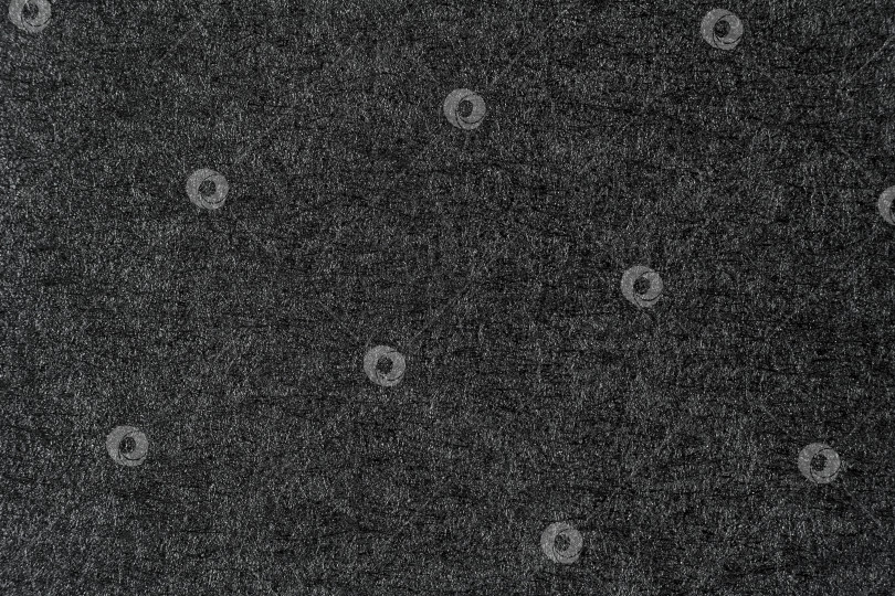 Скачать Шероховатая черная поверхность в качестве текстуры, фона (абстрактного) фотосток Ozero