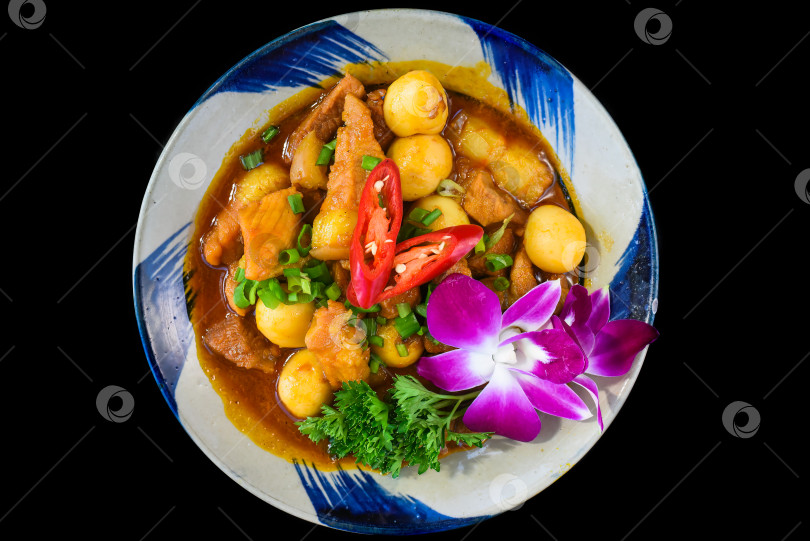 Скачать Тушеная свинина по-вьетнамски с вареными яйцами в соевом соусе для меню фотосток Ozero