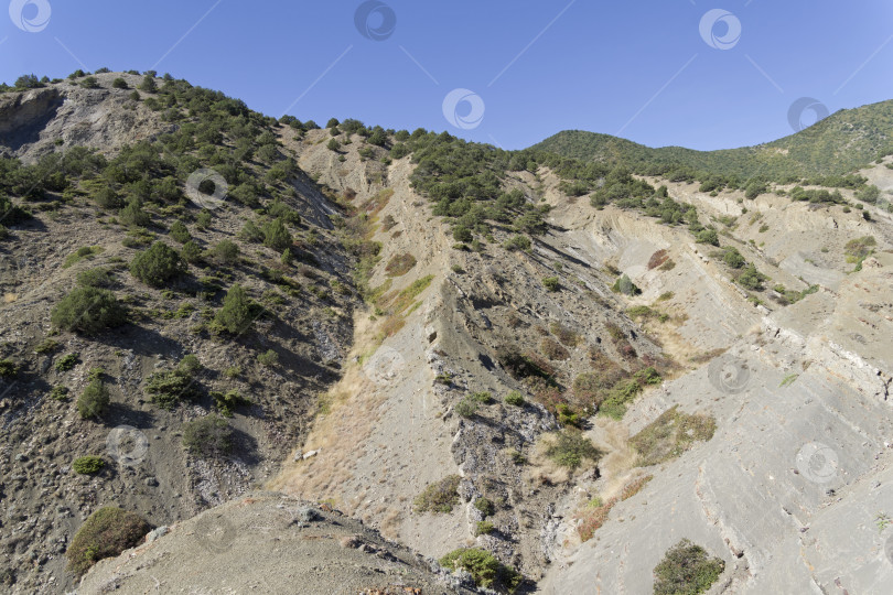 Скачать Глинистые ущелья у подножия гор. фотосток Ozero