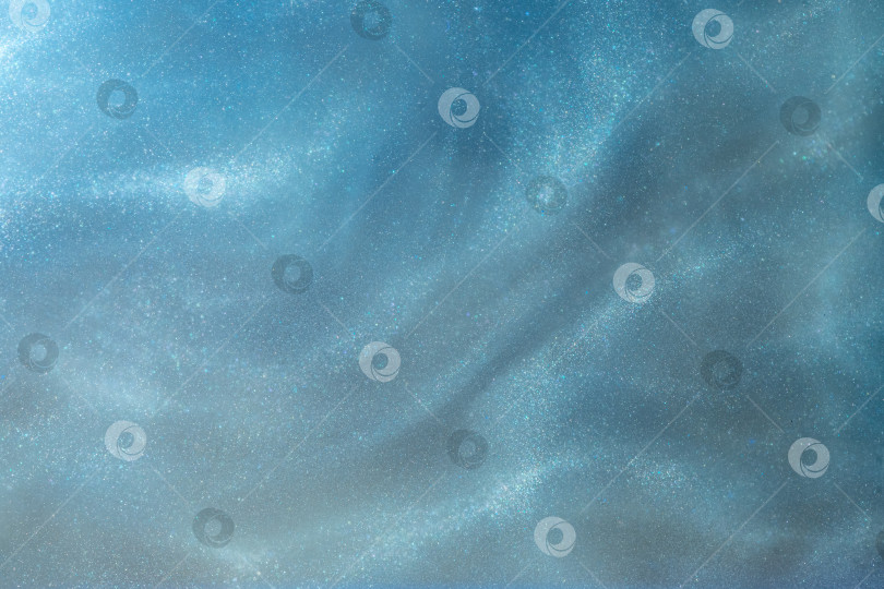 Скачать синий блестящий абстрактный фон. Краски, акрил, блестки в воде. фотосток Ozero