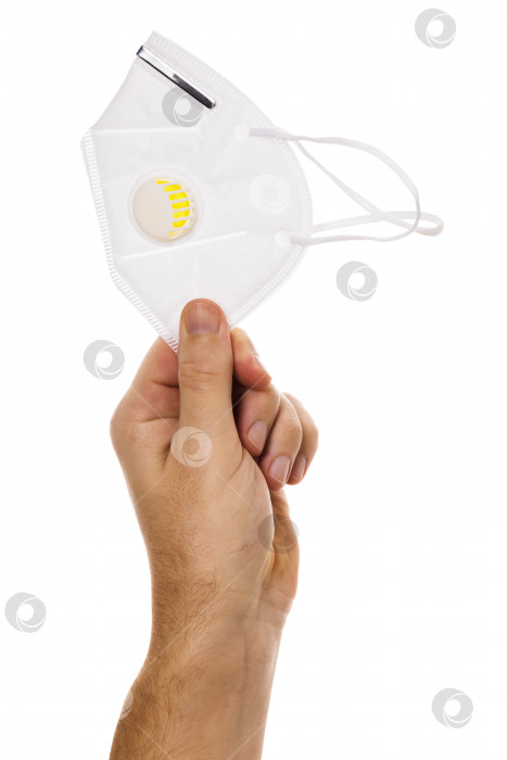Скачать Многоразовая медицинская маска с защитным фильтром в руке, выделенная на белом фоне фотосток Ozero