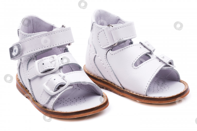 Скачать Анатомическая обувь для младенцев, выделенная на белом фоне фотосток Ozero