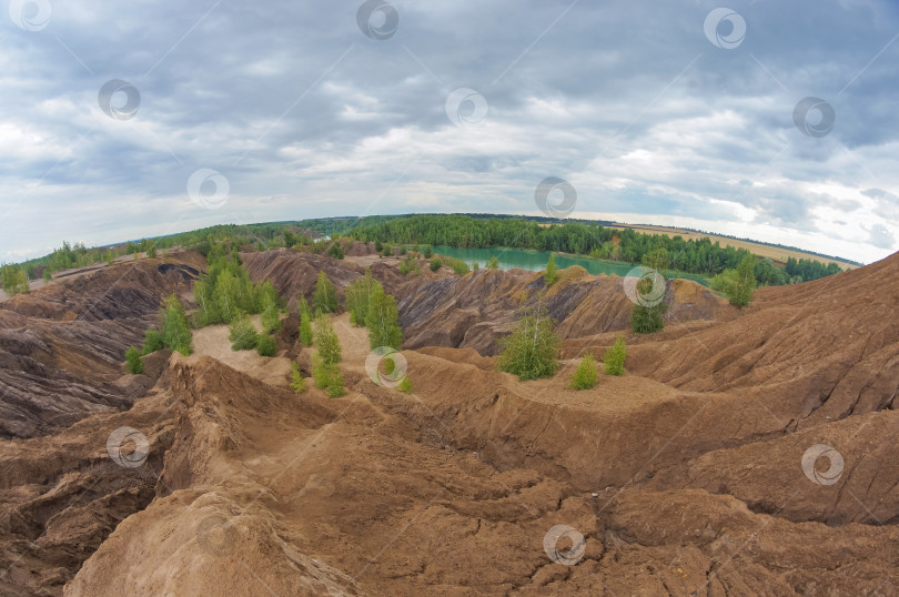 Скачать холмы в заброшенном карьере, насыпи в заброшенном карьере фотосток Ozero