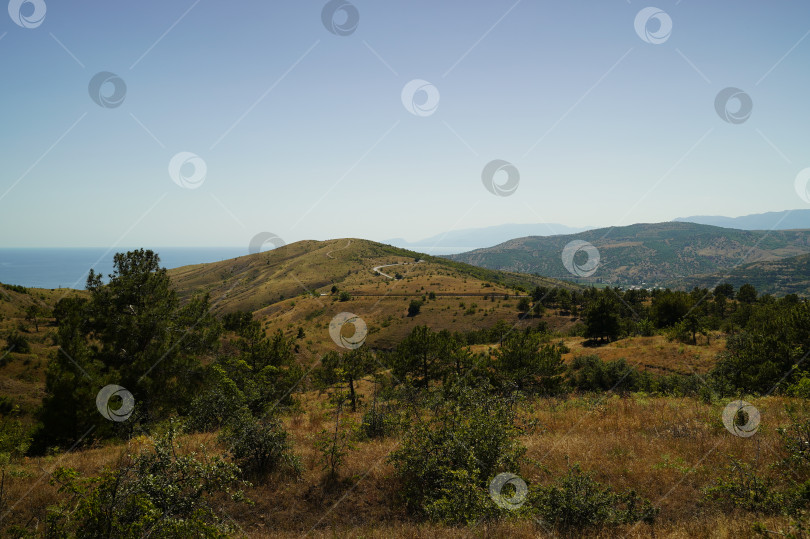 Скачать Вид на горную дорогу в горах фотосток Ozero