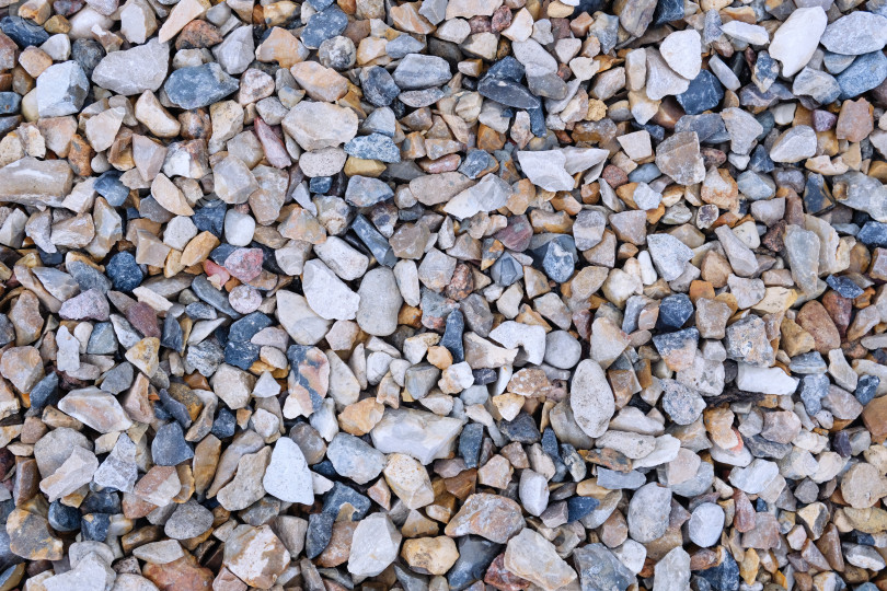 Скачать Текстура натурального щебня. Камни, щебеночный строительный материал. фотосток Ozero