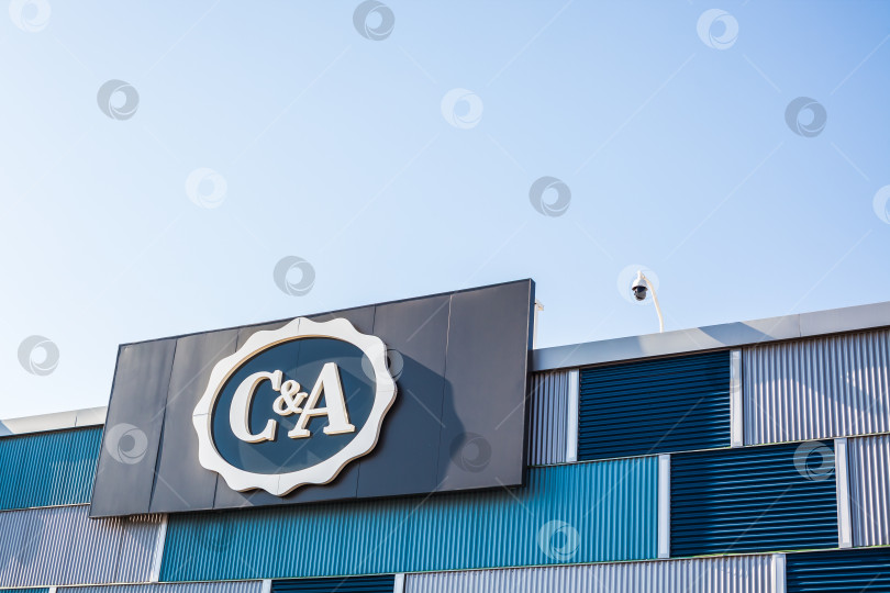 Скачать Логотип розничного магазина одежды C&A mass fashion фотосток Ozero