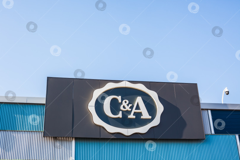 Скачать Логотип розничного магазина одежды C&A mass fashion фотосток Ozero