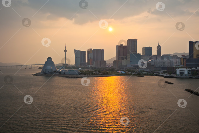 Скачать Городской пейзаж Макао на горизонте перед заходом солнца фотосток Ozero