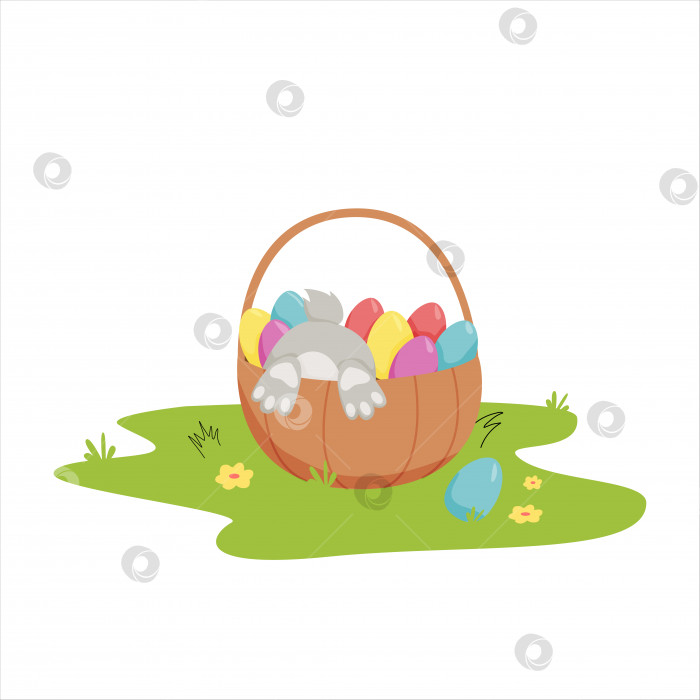 Скачать Счастливой пасхи. Кролик прячется в корзинке с пасхальными яйцами фотосток Ozero