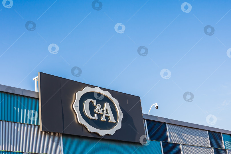 Скачать Логотип розничного магазина одежды C&A mass fashion фотосток Ozero