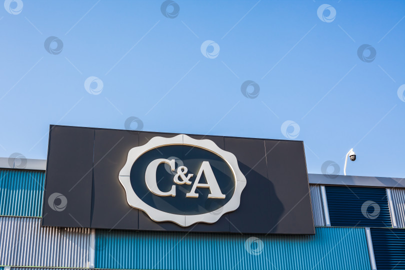 Скачать Логотип розничного магазина одежды C&A mass fashion фотосток Ozero