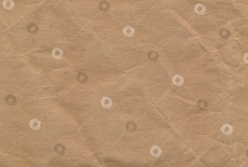 Скачать Абстрактный коричневый фон с текстурой мятой бумаги фотосток Ozero