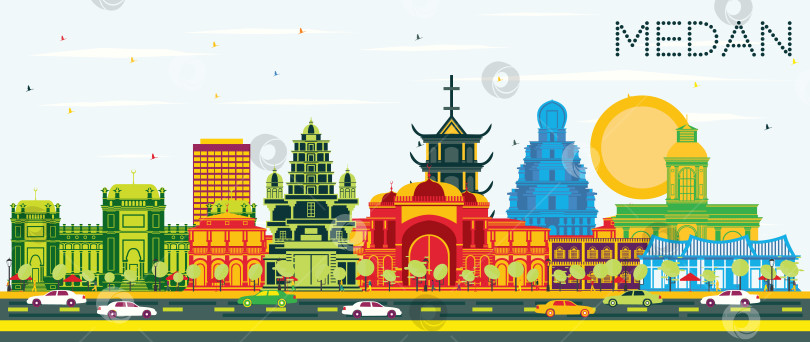 Скачать Горизонт индонезийского города Медан с цветными зданиями и голубым небом. фотосток Ozero