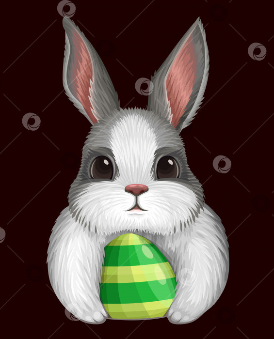Скачать Белый кролик с яйцом, выделенным на темном фоне фотосток Ozero