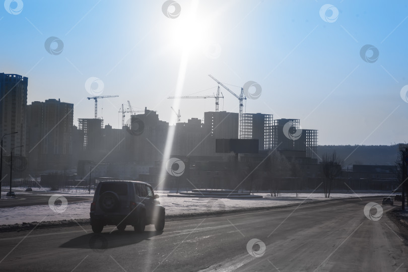 Скачать Строительство нового жилого комплекса зимой фотосток Ozero