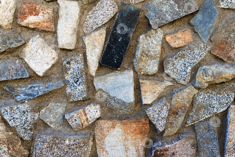Скачать Крупный план фрагмента старой стены из натурального камня фотосток Ozero