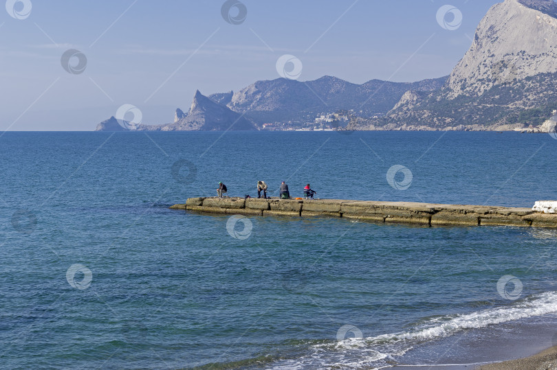 Скачать Морская рыбалка. Рыбаки на лодке. фотосток Ozero