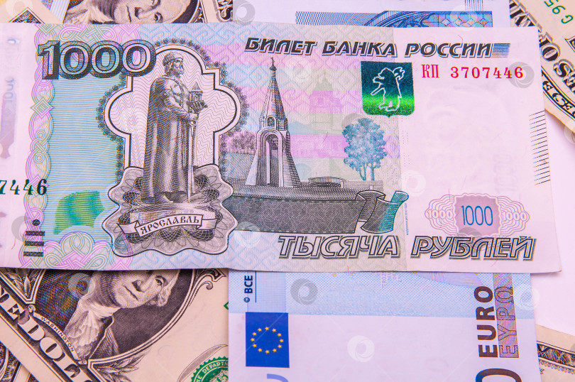 Скачать Мировые деньги - доллары, евро, российские рубли фотосток Ozero