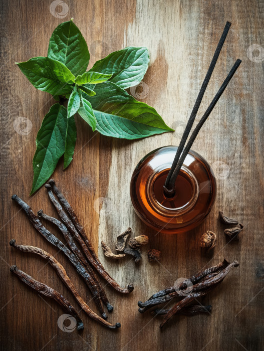 Скачать Аромат ванили и табака, окруженный натуральным декором flatlay фотосток Ozero