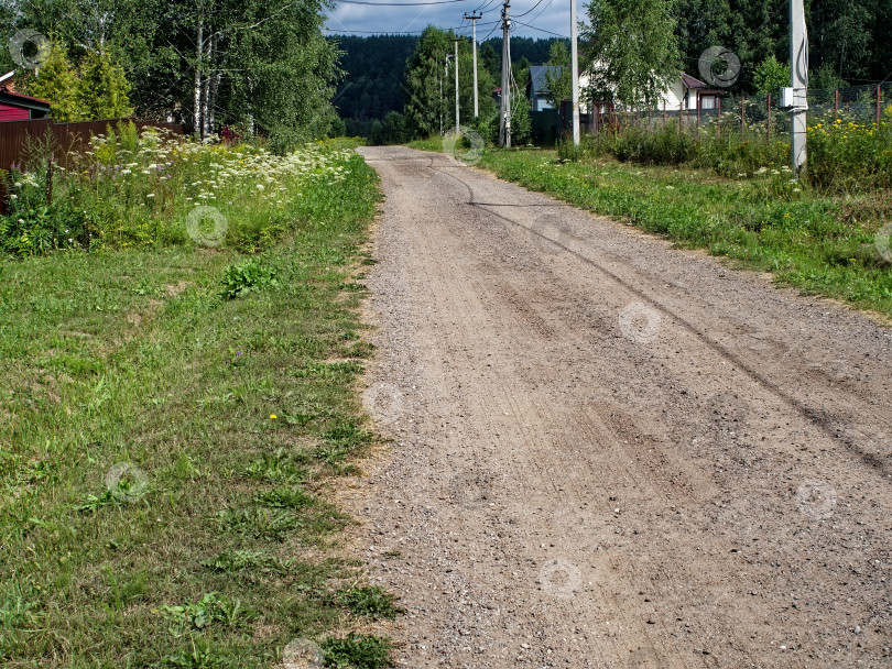 Скачать Грунтовая дорога в дачном поселке летом фотосток Ozero
