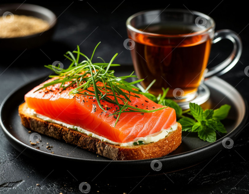 Скачать Тост с фарелем из красной рыбы, зеленью и чашкой чая. Создано с помощью искусственного интеллекта фотосток Ozero