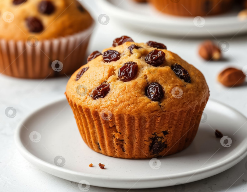 Скачать Кекс с изюмом на белом фоне. Создано с помощью искусственного интеллекта. фотосток Ozero