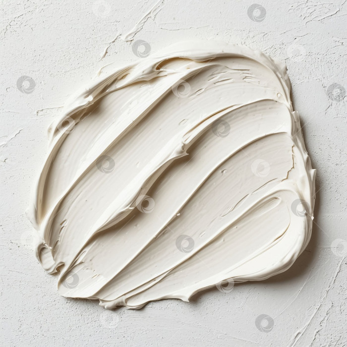 Скачать Мазок крема или пасты на белом фоне. Создан искусственный интеллект. фотосток Ozero