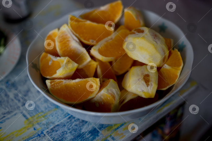 Скачать Апельсины в крупной нарезке для соковыжималки фотосток Ozero