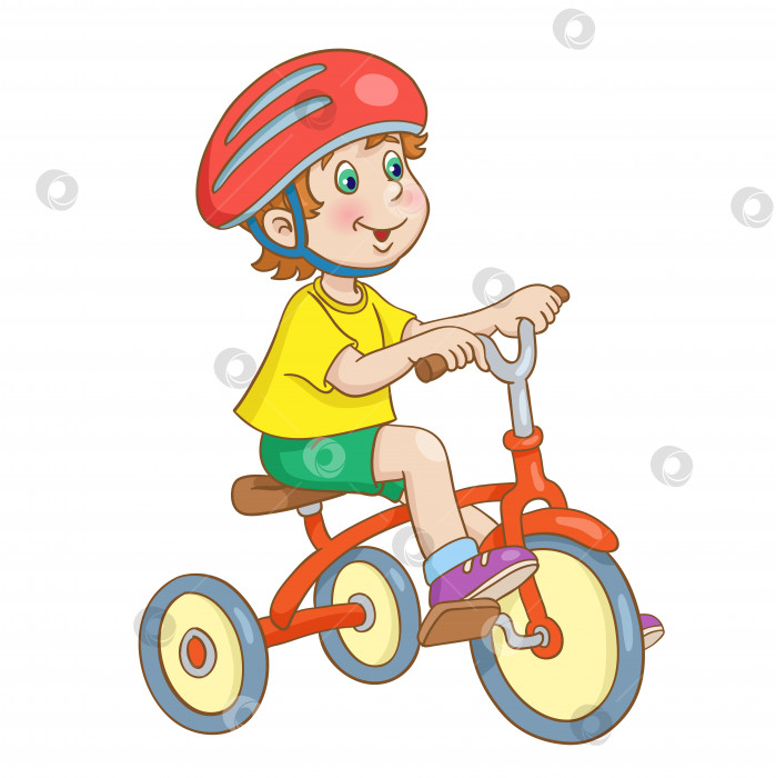 Скачать Маленький мальчик в большом красном шлеме катается на трехколесном велосипеде. фотосток Ozero