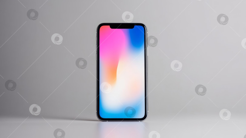 Скачать Современный дисплей смартфона, демонстрирующий яркие цвета на минималистичном фоне для презентаций технологических продуктов фотосток Ozero