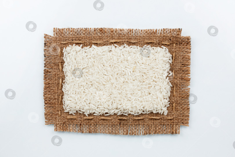 Скачать Классическая рамка из мешковины с рисовыми крупинками фотосток Ozero