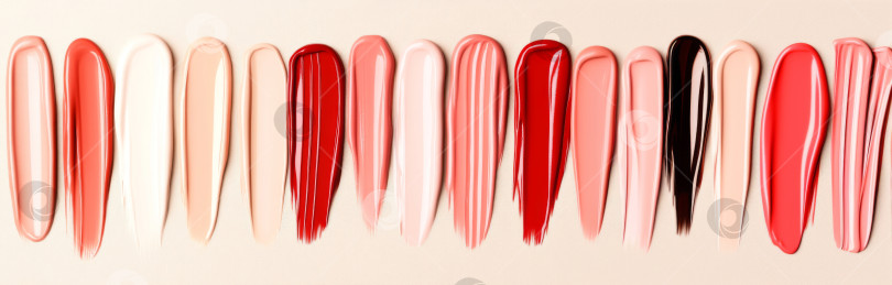 Скачать Текстура губной помады размазывается различными цветами для создания фона косметики фотосток Ozero