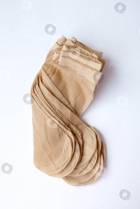 Скачать нейлоновые носки на белом фоне. очарование фотосток Ozero