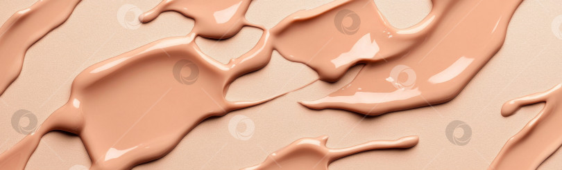 Скачать Жидкие текстуры косметики, нанесенные с помощью крема-хайлайтера, абстрактный фон фотосток Ozero