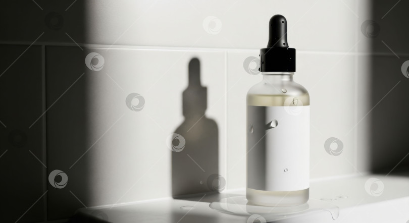 Скачать Флакон с косметической сывороткой для ухода за кожей. Контейнер-капельница с пустой этикеткой. Макет косметического продукта для концепции здоровья и спа. фотосток Ozero