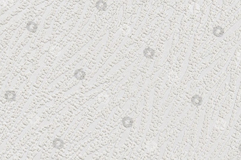 Скачать Текстура белых бумажных обоев с абстрактными ветвящимися рельефными линиями крупным планом. Оштукатуренная рельефная стена. фотосток Ozero