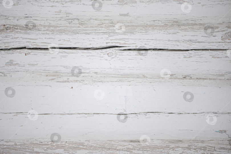 Скачать Текстура дерева светло-серая, состаренная, с трещинами и царапинами. фотосток Ozero