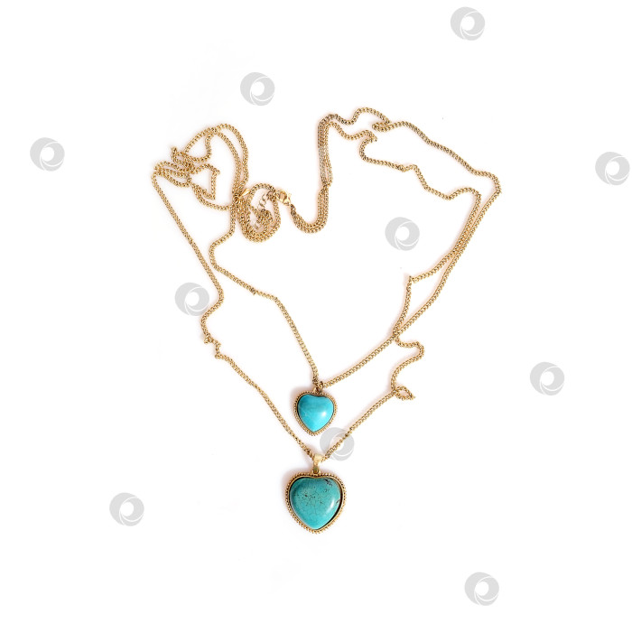 Скачать Золотое колье с бирюзой, выделяющейся на белом фоне фотосток Ozero