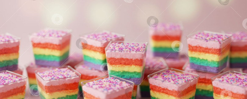 Скачать Множество индивидуальных радужных слоистых десертов в прозрачных квадратных бокалах с розовой глазурью и разноцветной посыпкой - концепция сладкого угощения. фотосток Ozero