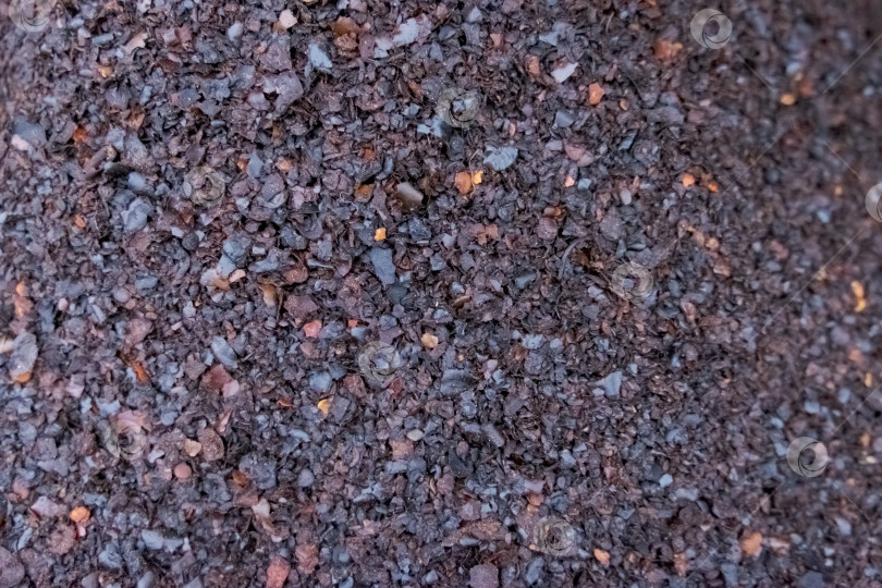 Скачать Куча коричневой грязи с несколькими черными камнями внутри фотосток Ozero