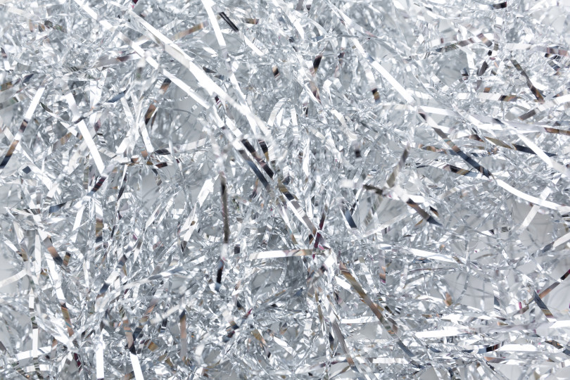 Скачать Рождественский, новогодний фон и текстура. Серебряная мишура или блестящие ленты фотосток Ozero