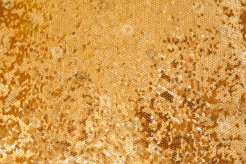 Скачать Рождественский и новогодний фон, материал, расшитый желтыми пайетками фотосток Ozero