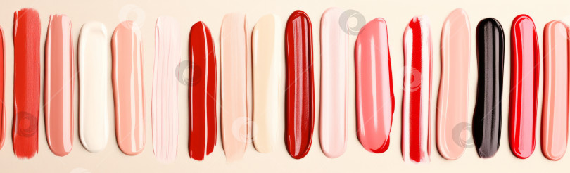 Скачать Текстура губной помады размазывается различными цветами для создания фона косметики фотосток Ozero