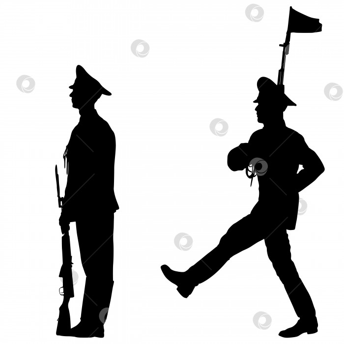Скачать Солдат в черном костюме марширует с оружием в руках на параде фотосток Ozero