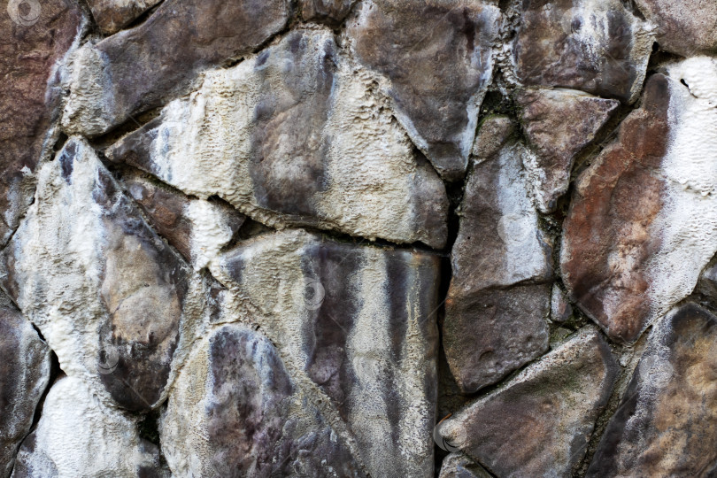 Скачать Подробный вид скальной стены с большим количеством камней крупным планом фотосток Ozero