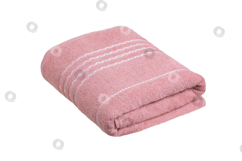 Скачать разноцветные махровые полотенца, свернутые в рулон и разложенные стопкой на столе фотосток Ozero