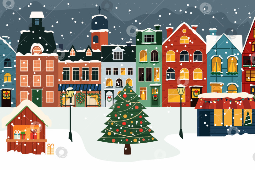 Скачать Зимний рождественский пейзаж с заснеженными домами. Зимний город фотосток Ozero