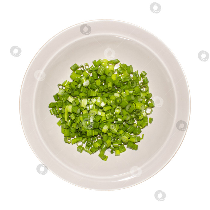 Скачать Нарезанный кольцами зеленый лук.Мелко нарезанные кружочки перьев ярко-зеленого лука.На фоне зеленого лука. фотосток Ozero