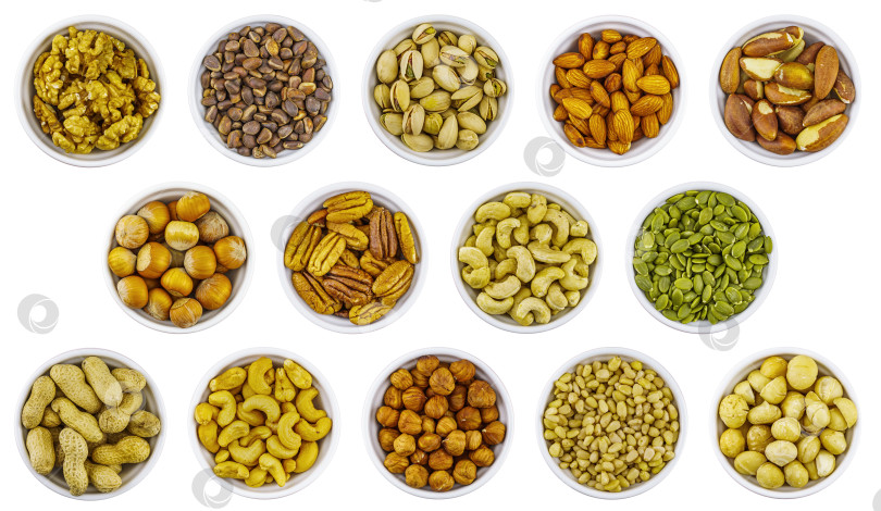 Скачать Ассортимент орехов сверху на белом фоне фотосток Ozero