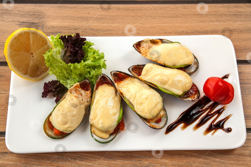 Скачать Мидии, запеченные в панцире фотосток Ozero